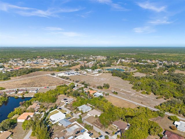 12306 HARLAND AVENUE, North Port, FL 34287