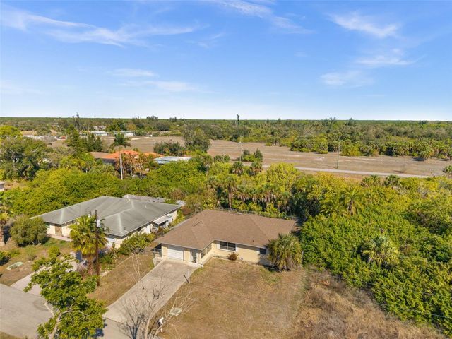 12306 HARLAND AVENUE, North Port, FL 34287