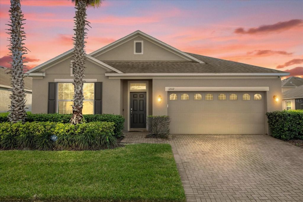 Image 1 of property listing at 12112 SAWGRASS RESERVE BOULEVARD, Orlando, FL 32824