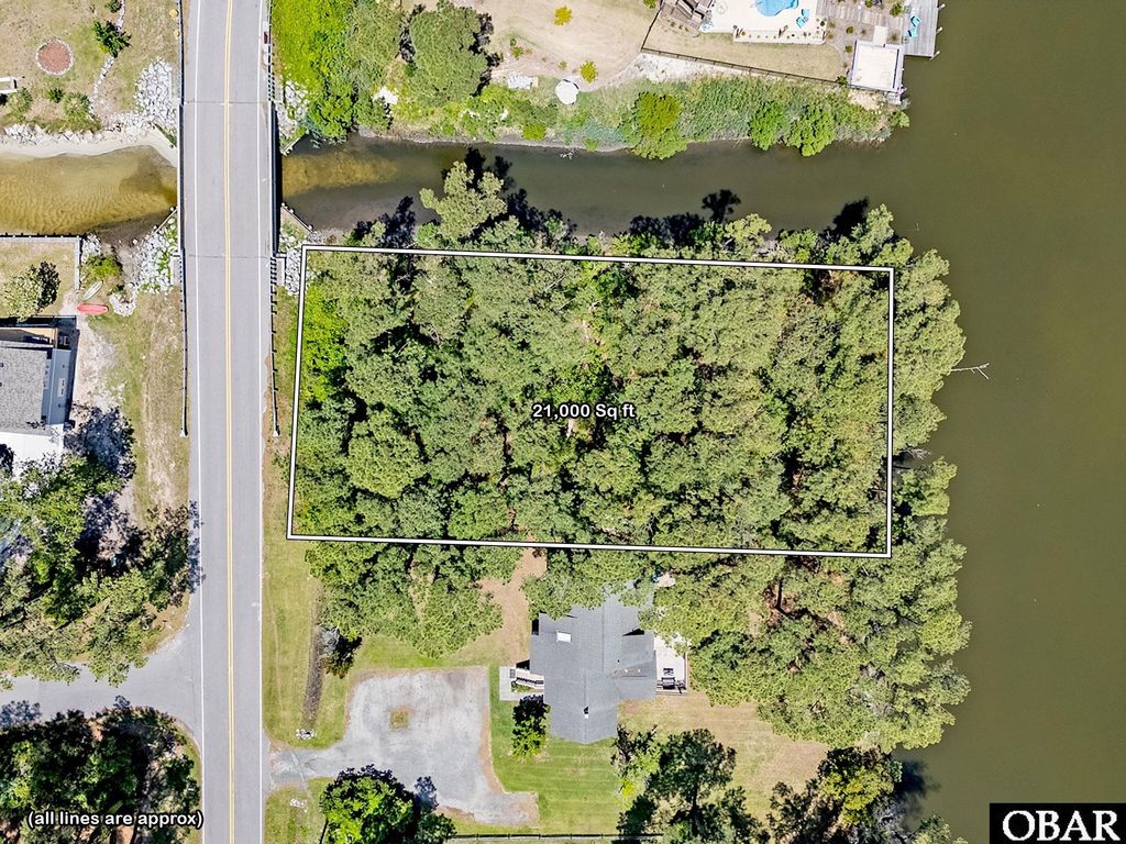 Image 1 of property listing at 1144 Burnside Road Lot E6 Sec 2, Manteo, NC 27954