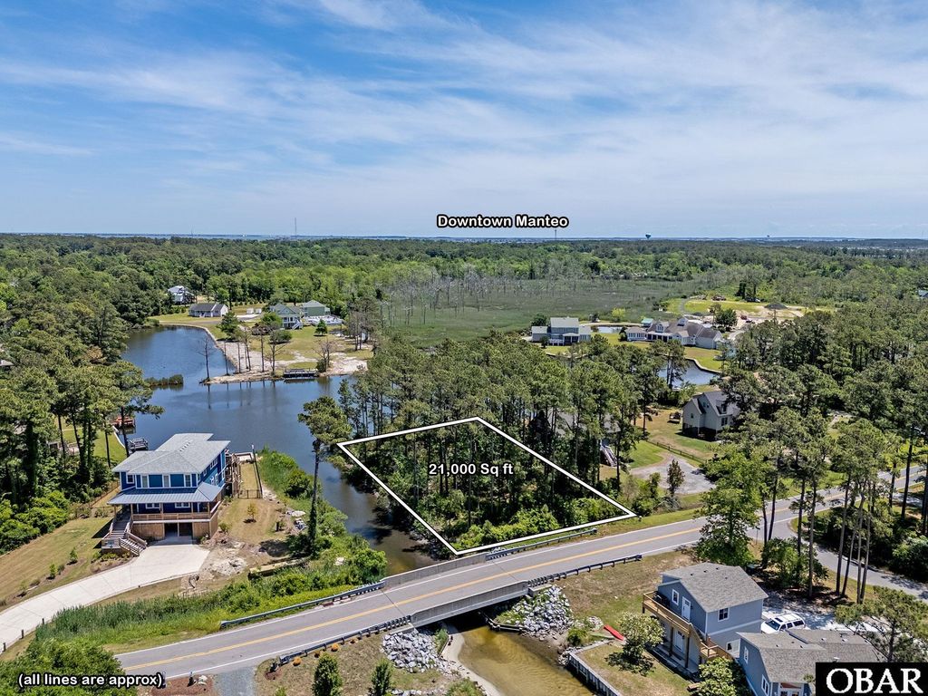 Image 13 of property listing at 1144 Burnside Road Lot E6 Sec 2, Manteo, NC 27954