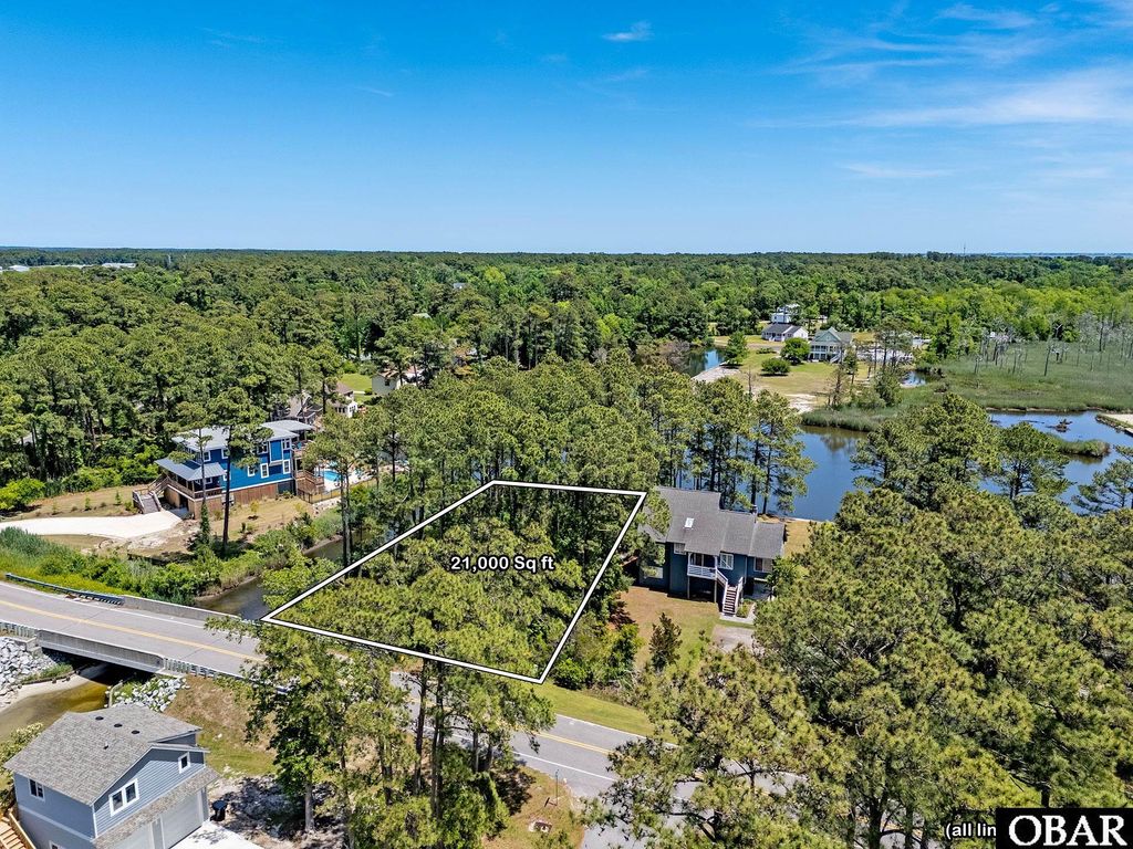 Image 6 of property listing at 1144 Burnside Road Lot E6 Sec 2, Manteo, NC 27954