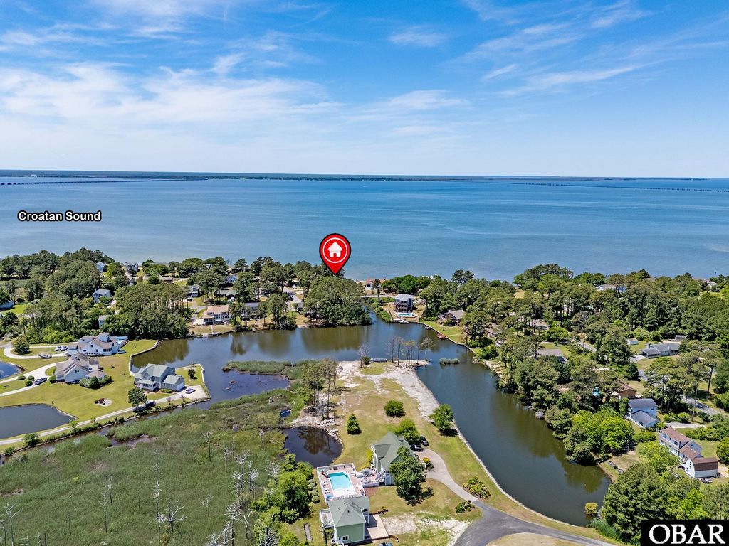 Image 10 of property listing at 1144 Burnside Road Lot E6 Sec 2, Manteo, NC 27954