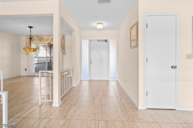 711 Mirror Lakes DR, Lehigh Acres, FL 33974