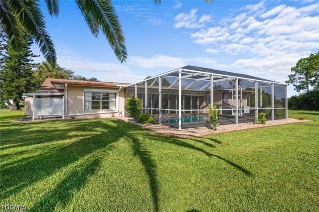 711 Mirror Lakes DR, Lehigh Acres, FL 33974