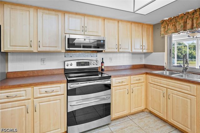 711 Mirror Lakes DR, Lehigh Acres, FL 33974