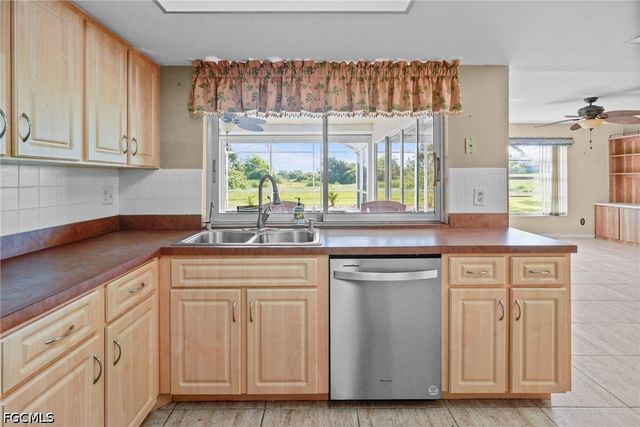 711 Mirror Lakes DR, Lehigh Acres, FL 33974