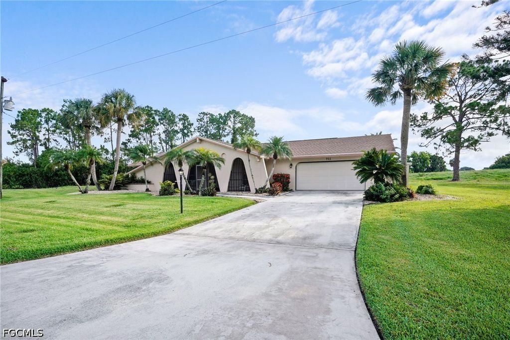 711 Mirror Lakes DR, Lehigh Acres, FL 33974