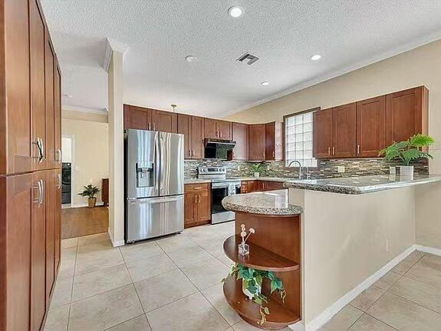 5877 NW 73rd Court, Parkland, FL 33067