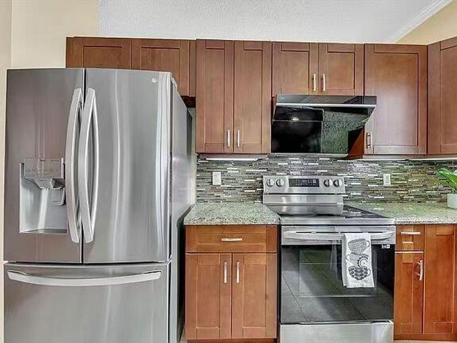 5877 NW 73rd Court, Parkland, FL 33067