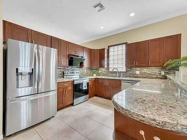 5877 NW 73rd Court, Parkland, FL 33067
