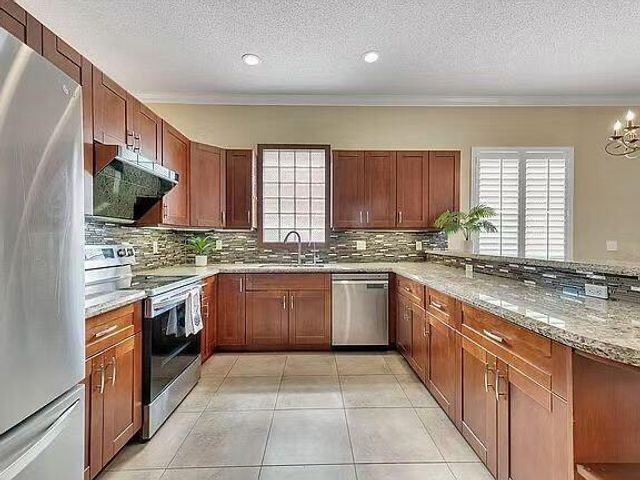 5877 NW 73rd Court, Parkland, FL 33067