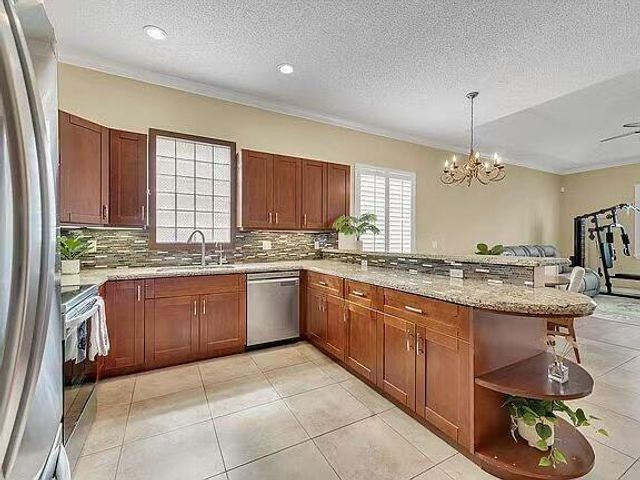 5877 NW 73rd Court, Parkland, FL 33067