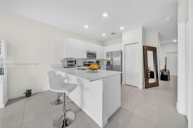 12917 NW 23rd Pl, Miami, FL 33167