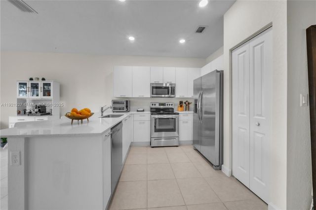 12917 NW 23rd Pl, Miami, FL 33167