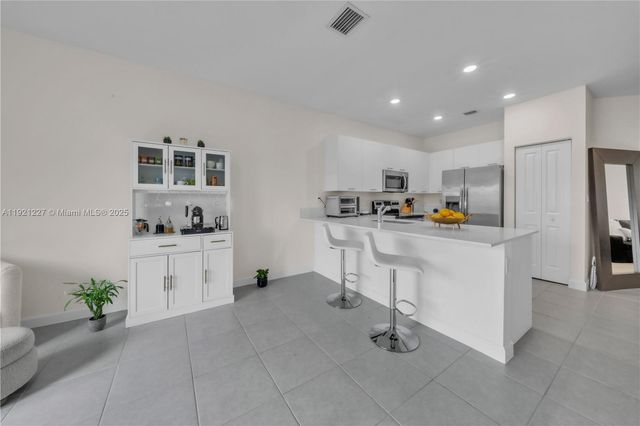 12917 NW 23rd Pl, Miami, FL 33167