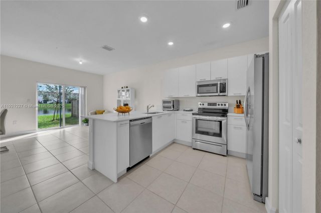 12917 NW 23rd Pl, Miami, FL 33167