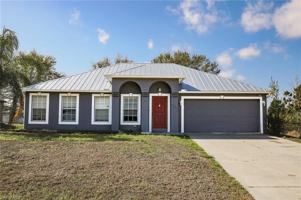 3209 54th ST W, Lehigh Acres, FL 33971