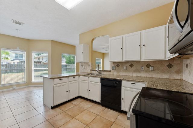 23806 Spring Way Drive, Spring, TX 77373