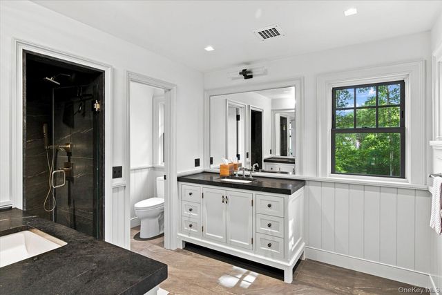 15 Wild Cherry Lane, East Quogue, NY 11942