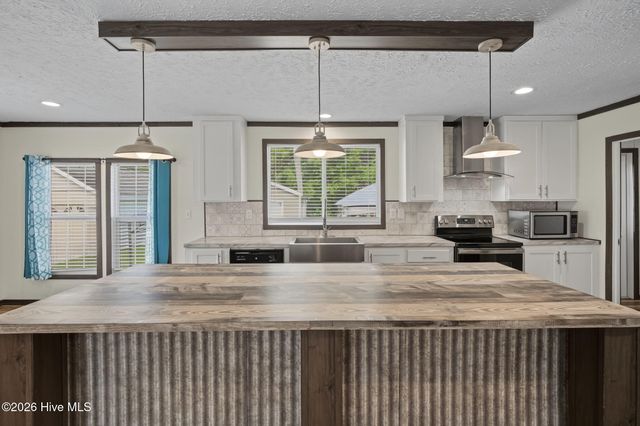 908 Palmer Drive, Carolina Shores, NC 28467