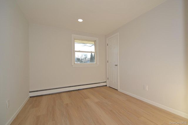 15 Allegheny Drive E, Farmingville, NY 11738