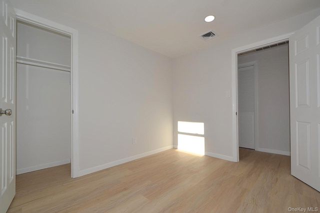 15 Allegheny Drive E, Farmingville, NY 11738