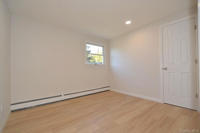 15 Allegheny Drive E, Farmingville, NY 11738