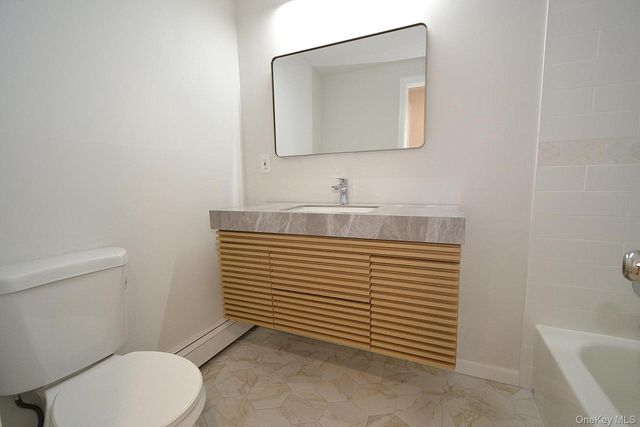 15 Allegheny Drive E, Farmingville, NY 11738