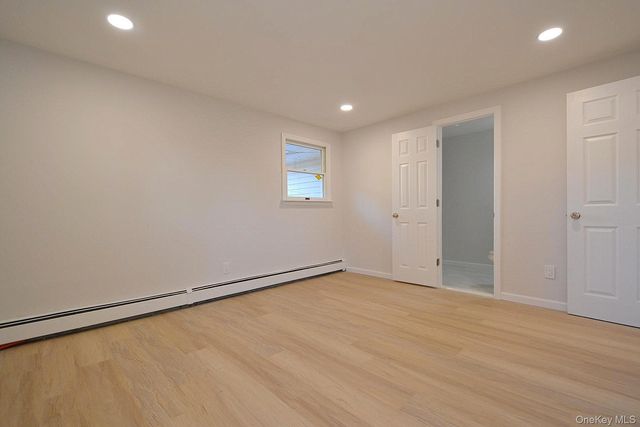 15 Allegheny Drive E, Farmingville, NY 11738