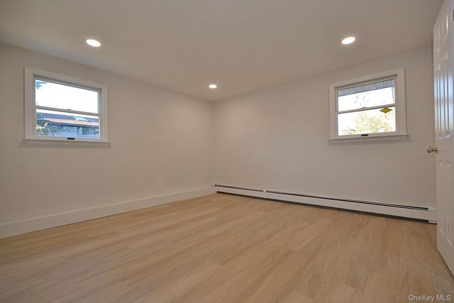 15 Allegheny Drive E, Farmingville, NY 11738