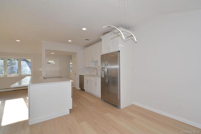 15 Allegheny Drive E, Farmingville, NY 11738