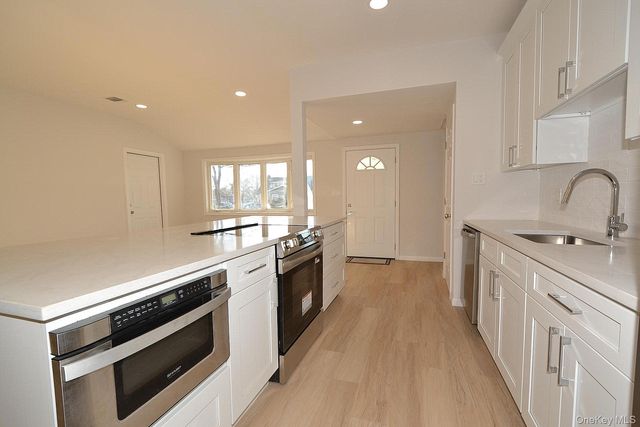 15 Allegheny Drive E, Farmingville, NY 11738