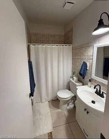 1046 Oak Forest DR, Naples, FL 34104