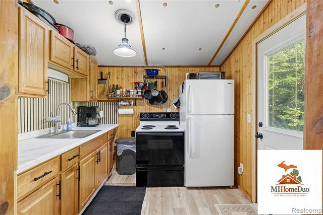 6960 Rumsay Street, Harrison, MI 48625