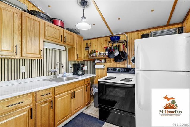 6960 Rumsay Street, Harrison, MI 48625
