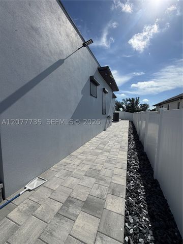 910 NW 38th AVE, Cape Coral, FL 33993
