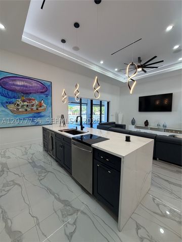 910 NW 38th AVE, Cape Coral, FL 33993
