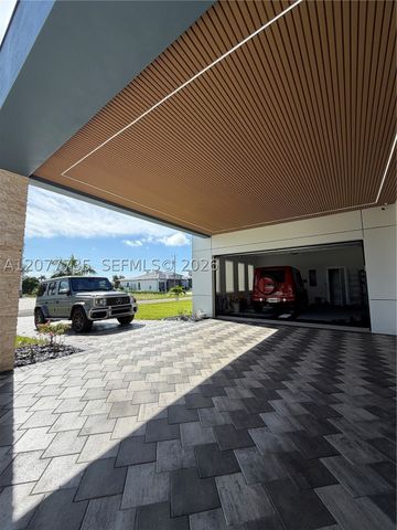 910 NW 38th AVE, Cape Coral, FL 33993