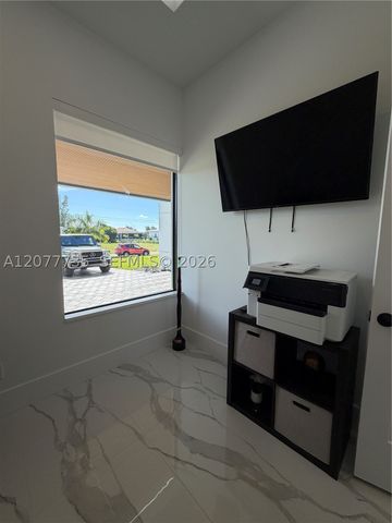 910 NW 38th AVE, Cape Coral, FL 33993