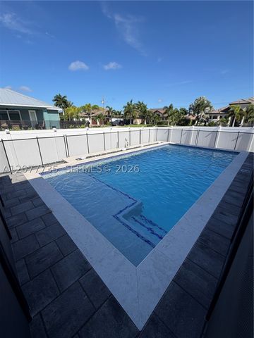 910 NW 38th AVE, Cape Coral, FL 33993