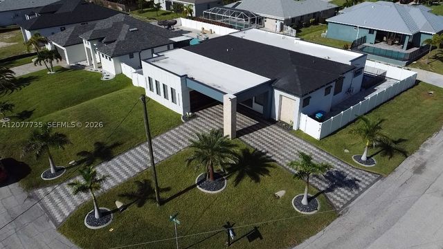 910 NW 38th AVE, Cape Coral, FL 33993