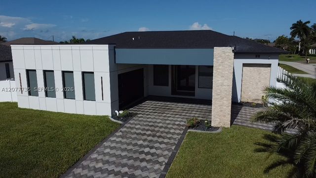 910 NW 38th AVE, Cape Coral, FL 33993