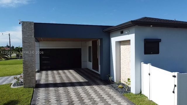 910 NW 38th AVE, Cape Coral, FL 33993