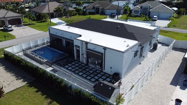 910 NW 38th AVE, Cape Coral, FL 33993