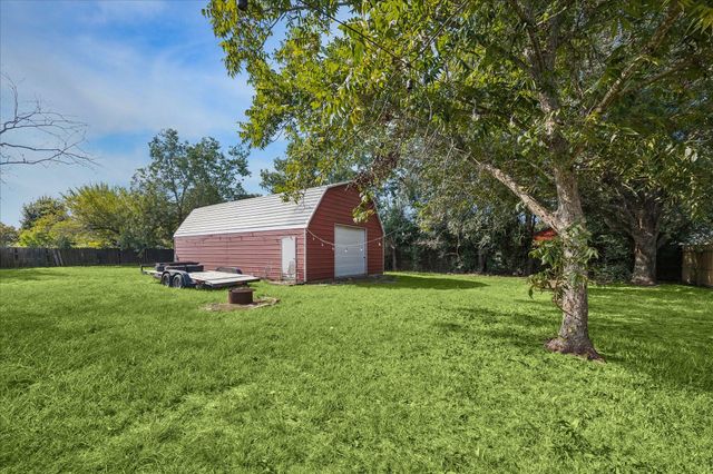 26003 Saint Florent Drive, Tomball, TX 77377