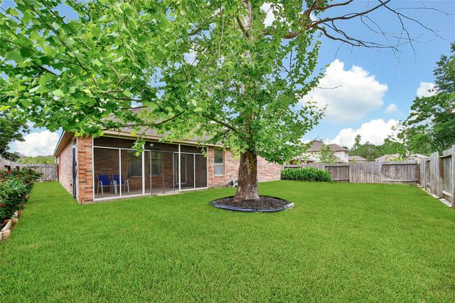 911 River Crossing Drive, Conroe, TX 77384