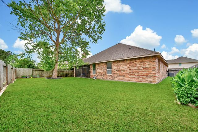 911 River Crossing Drive, Conroe, TX 77384