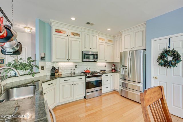 87 Queensbury Court, Morganville, NJ 07751
