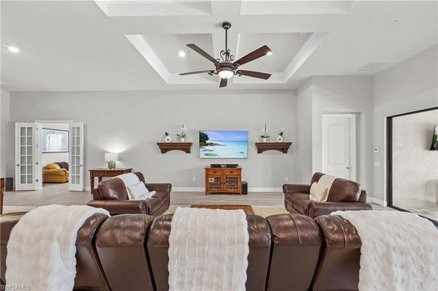 7716 Winding Cypress DR, Naples, FL 34114